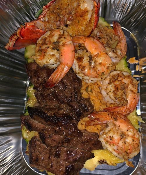 Steak lobster and shrimp ultimate pineapple bowl