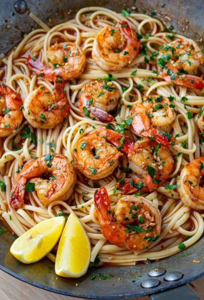 Satisfy your cravings with this flavorful Cajun BBQ Shrimp Scampi Linguine recipe. Perfect for a special dinner or a weeknight meal.