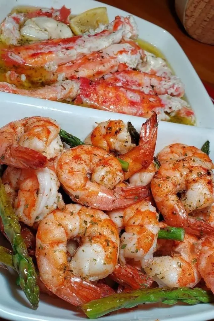 Delicious King Crab Scampi & Garlic Roasted Shrimp on a plate.