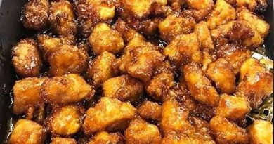 Baked Sweet and Sour Chicken - Crispy chicken pieces coated in a flavorful sauce, served with rice