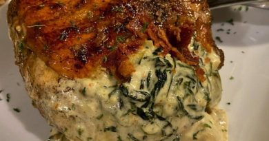 Chicken Breast Stuffed With Hot Bacon – Crispy golden brown chicken adorned with a spinach and artichoke cream, a feast for the senses.