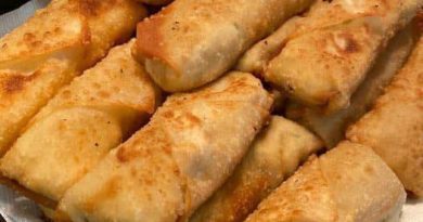 Crispy Crab Rangoon Egg Rolls filled with fresh crab, cream cheese, and spices – a golden delight for your taste buds.