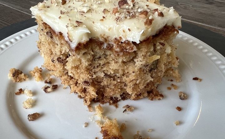 Preacher Cake - A moist and flavorful delight topped with cream cheese frosting and chopped pecans.