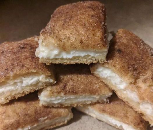 Cream Cheese Squares - A delightful dessert masterpiece with layers of creamy goodness and a golden cake base.
