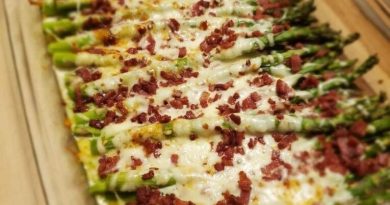 Cheesy Asparagus Casserole in a baking dish, ready to serve.