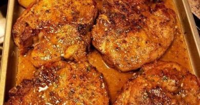 Sheet pan pork chops with multi-colored potatoes and red onion