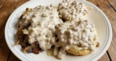Sausage Gravy over Fresh Biscuits and Fried Taters and onions