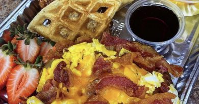 Three brunch dishes on a plate: Honey Chicken Sliders on mini buns, Shrimp & Grits in a bowl, and Loaded Breakfast Potatoes in a skillet.