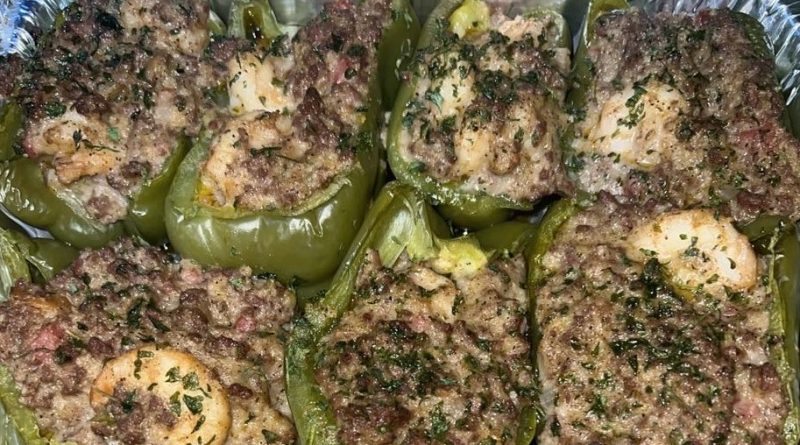 New Orleans Stuffed Bell Peppers on a baking sheet, ready to be enjoyed.