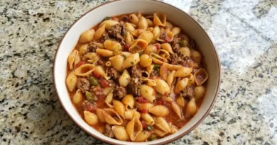 "Delicious Pasta Shells with Ground Beef served in a white baking dish"