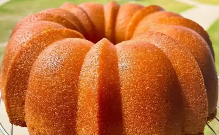 Butter Three Times Pound Cake recipe beautifully sliced on a plate