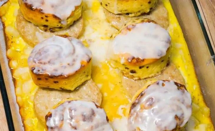 Sausage Egg Casserole Topped with Cinnamon Rolls