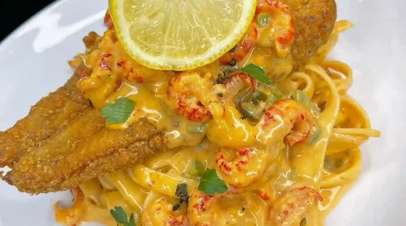 Louisiana Cajun Crawfish Fettuccine Topped with Fried Catfish