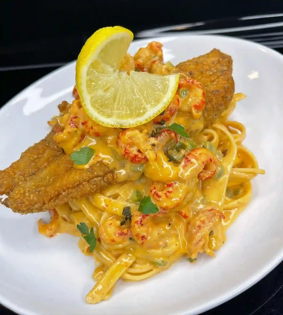Louisiana Cajun Crawfish Fettuccine Topped with Fried Catfish
