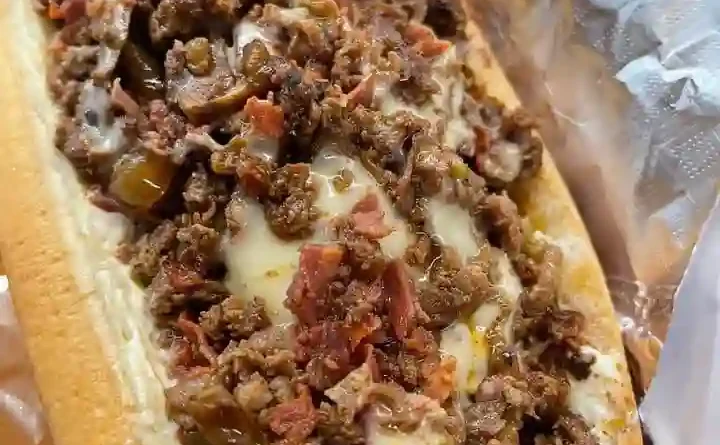 Steak bomb steak, capicola, grilled onions, mushrooms, peppers and cheese