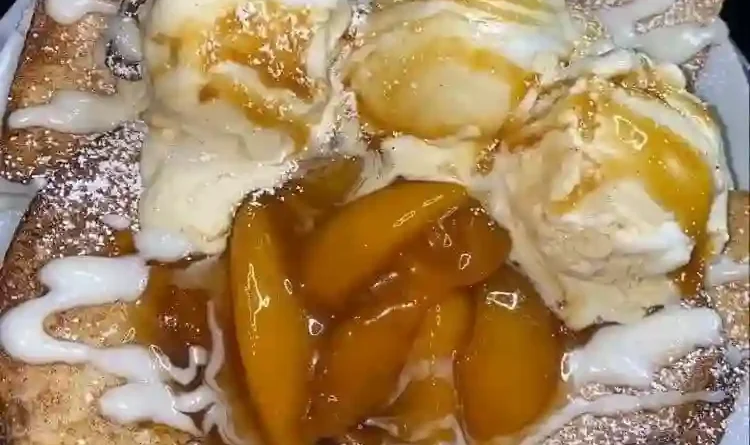 Hot Peach Cobbler with Vanilla Ice cream