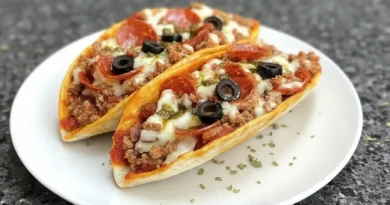 Meat Lovers Pizza Tacos - A mouthwatering fusion of bacon, Italian sausage, and mozzarella in a taco shell.