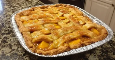 Homemade Peach Pie with Flaky Crust and Juicy Peach Filling